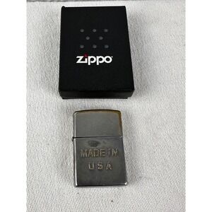 Vintage Zippo lighter‎ Made in USA on front.